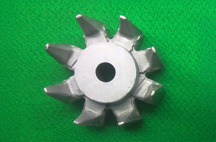 An AC pole created by the cold forging process